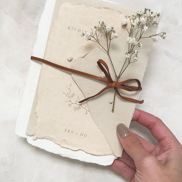 Handmade paper and leather. What a charming aesthetic